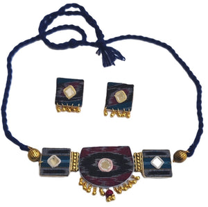 Jewelry set with necklace and earrings on a white background