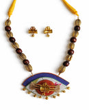 Jewelry set with necklace and earrings on a white background